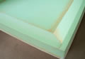 Extra density foam bath (foam dam) for soft sider beds